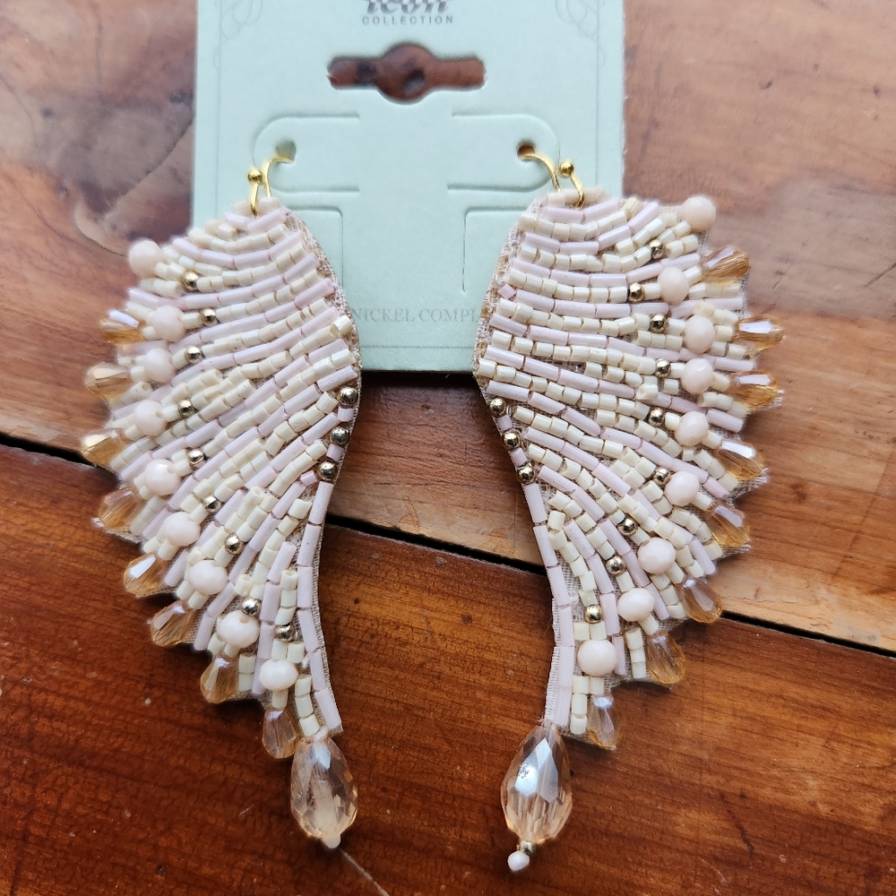 Sold!! Creamy White Angel Wings Pierced Earrings